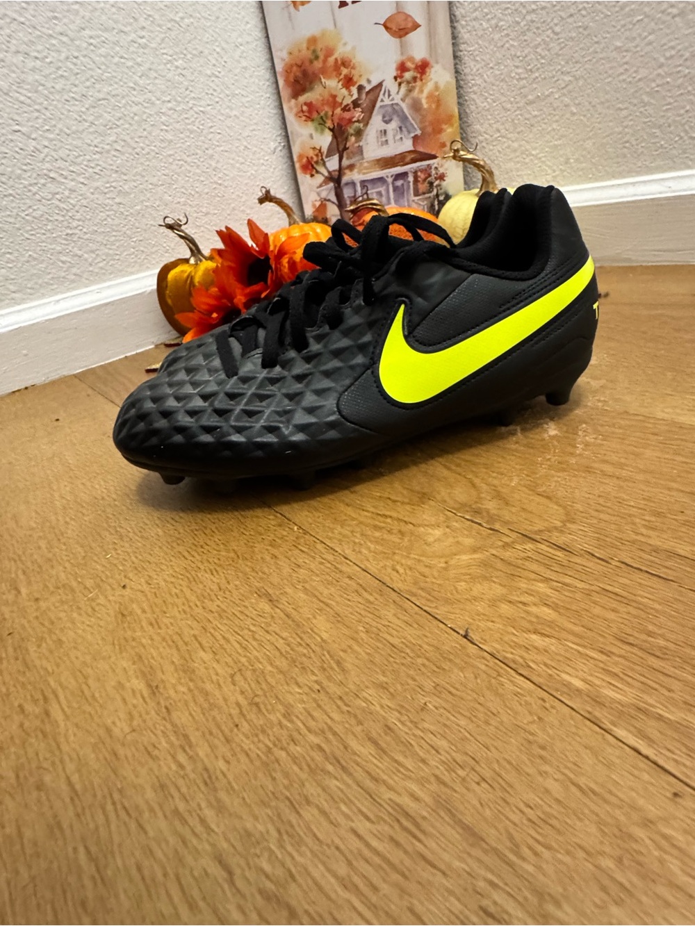 Nike Kids Black Soccer Cleats with Neon Yellow Swoosh